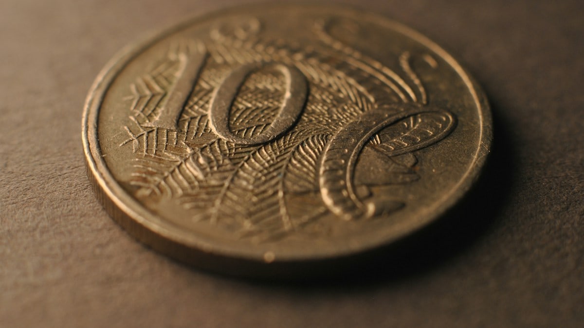 A close up of a coin on a table